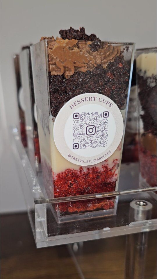 Layered red velvet and chocolate dessert cup