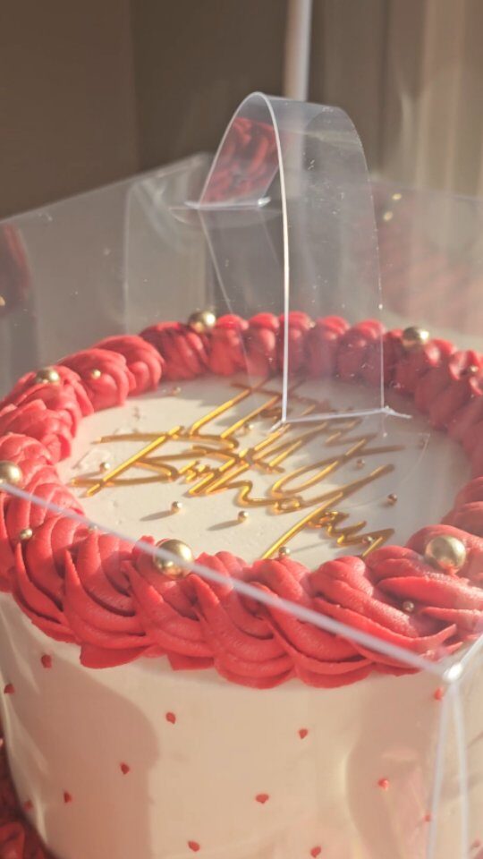 Pink drip celebration cake
